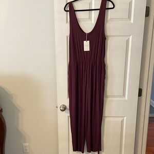 Elegant Plum Jumpsuit size L brand new two front pockets bust 34” inseam 24”